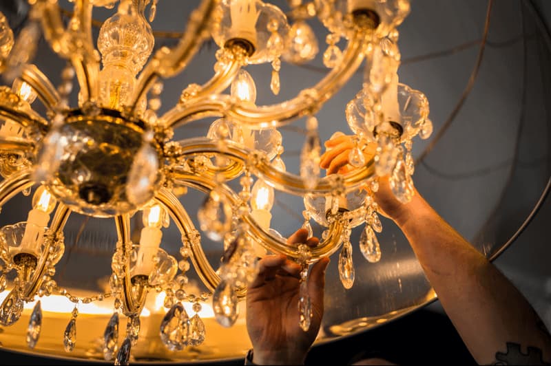 Chandelier being repaired